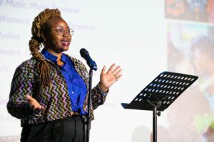 A speaker at the Connecting Place, Culture and Research event.